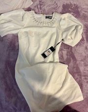 Never worn and new with tags  Paris dress