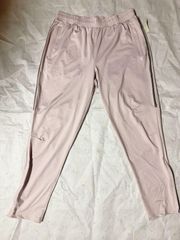 essentials grey pink comfy silky active pants zipped pockets and hem Sz L NWT New with tag Same day shipping  Smoke and pets free  Elevate your activewear game with these stylish and functional jogger pants from  Essentials. The solid pink color with zipped pockets and hem adds a touch of American classic to your wardrobe. Made of breathable polyester, it promises comfort and ease of movement during your workout routine.  Perfect for fall, winter, and spring, these pants come with an elastic waistband and straight leg style. Ideal for women who love a combination of style and functionality, the pants are suitable for various occasions like activewear and athleisure. Get ready to rock your workout sessions in style with these comfy pants.