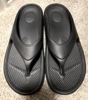 Black comfy flip flops