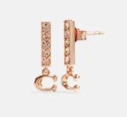 Coach rose gold earring​​​​