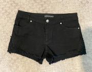 NWOT  jean shorts with lace trim. Sz M