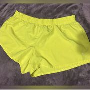 DANSKIN NOW neon yellow athletic shorts