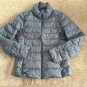 Uniqlo light weight puffer jacket. Water resistant. unisex.Color- navy. Size- XS