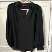 New York & Company polyester top with a V-neck and colar
