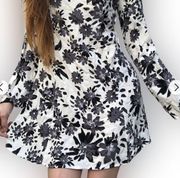 Long sleeve black and white floral print lace up back mini dress size medium