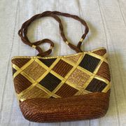 Worthington vintage woven shoulder bag with metallic embellishment.