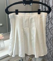 White pleated skirt