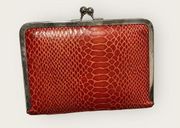 Vintage burnt orange leather wallet/clutch. Great condition.