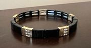 NWOT Black/Gold Colored Stretchy bracelet with Crystal Studs