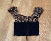 I am gia I.AM.GIA Rhia Lace Up Corset Top in Leopard and Black