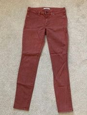 Rich and skinny burnt orange brown skinny jeans in size 27