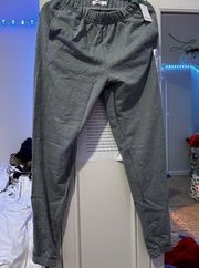 grey hands sweat pants