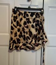 Missguided Misguided size 0, cheetah skirt. Ties on side.