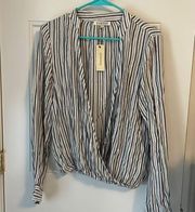 Francesca’s button down. Never worn. Size M. Blue & white stripped w/silver.