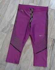 Nike New  women's small purple Dri-Fit capri leggings