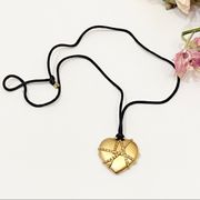 Vintage Estée Lauder Heart Locket Necklace