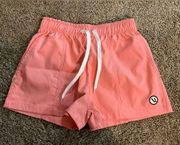 Vuori bright coral color shorts