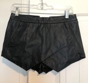 L  black pleather zip up skirt with shorts underneath.