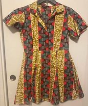 THE OULA COMPANY STRUCTURED RED YELLOW ANYWHERE PRINTED A-LINE SHIRTDRESS S/M