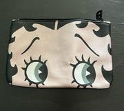 Ipsy makeup bag. Black sequence on the back.