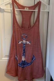 Pink razor back tank with anchor on front. Size M from Oneill.