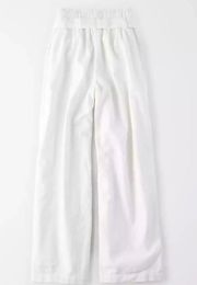 paper bag high waisted white wide leg pants , with belt