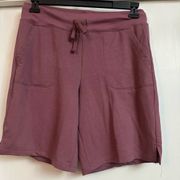 Athletic works mauve shorts. Size medium(8-10).