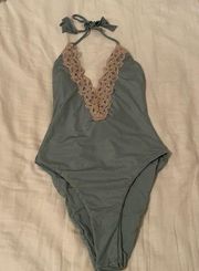 One piece cut out swimsuit. Never been used!