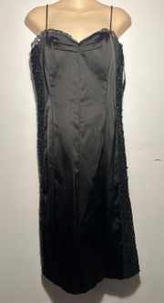 Elegant women's satin dress. The sides of the dress are decorated with lace and inserts. Betsy&Adam brand. Size 14. $60.