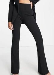 designs black flared pants  Size 0