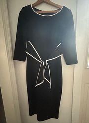 Adrianna Papell size 4 dress with faux bow/belt detail. Flattering silhouette.