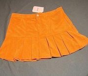 ELODIE PLEATED HEM MINI SKIRT YELLOW (MUSTARD) SIZE L NEW WITH TAGS