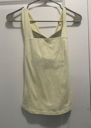 Arcteryx pale yellow cross back workout tank top