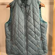 Light weight quilted olive green vest. Size XL.