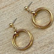 Gold tone triple ring earrings