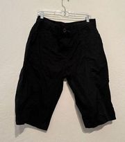 Chicos, black cotton spandex, long short, clamdiggers size 2.5.
￼