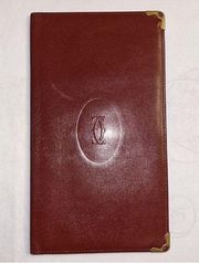 Cartier Unisex Burgundy Leather Bifold Wallet.