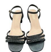 3” black heel and 3 sequins straps. Size 8.