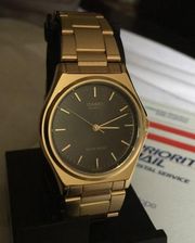 Casio gold tone medium classic unisex new watch