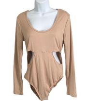 Love Streak Bodysuit Size L NWT  Elevate your wardrobe with this gorgeous Love Streak Bodysuit. Perfect for any occasion, this  features a flattering beige color and comfortable regular fit. The bodysuit is designed with a beautiful Love Streak brand that adds a touch of style and elegance. It's made with high-quality materials that guarantee durability and comfort.  This size L bodysuit is new with tags and is sure to make you feel confident and stylish. Whether you're dressing up for a night out or keeping it casual, this Love Streak Bodysuit is a must-have addition to your wardrobe.