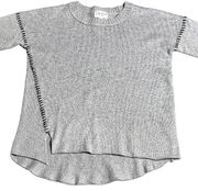 TERRE Jacobs Feel the Piece Asymmetrical Hem Whipstitched Seams Crewneck Sweater