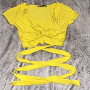 yellow v neck cross top