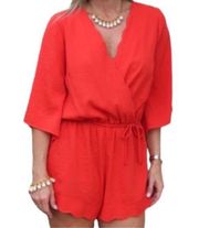 UMGEE bell sleeve romper women’s size Small with scalloped edges short orange