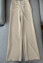 beige high waisted trousers