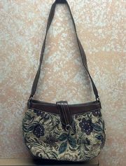 Relic brand tapestry purse.