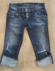 NWOT distressed  capri jeans with zipper bottom. Sz 28