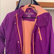 Purple and orange rain jacket