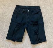 American bazi long black ripped jean shorts in size small