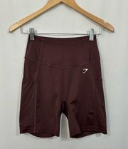 GYMSHARK High Rise Side Pocket Bike Shorts in Plum