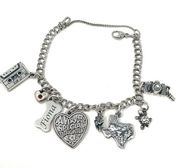 sterling silver charm bracelet, 8 charms